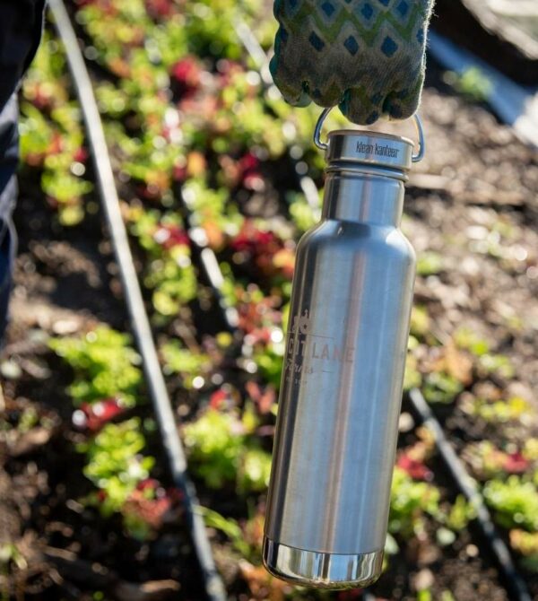 Farmer with Klean Kanteen in garden